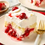 Heaven on Earth cake layered with cherry filling, pudding, and whipped topping