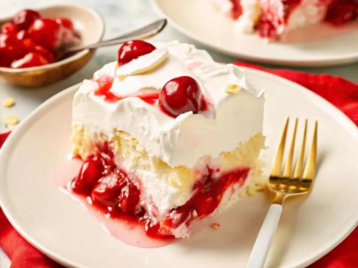 Heaven on Earth cake layered with cherry filling, pudding, and whipped topping