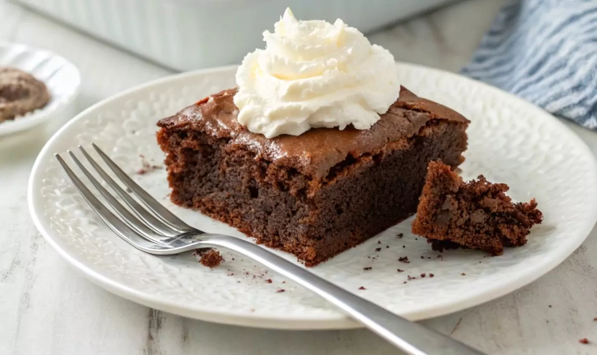 serving of soda cake with whipped cream