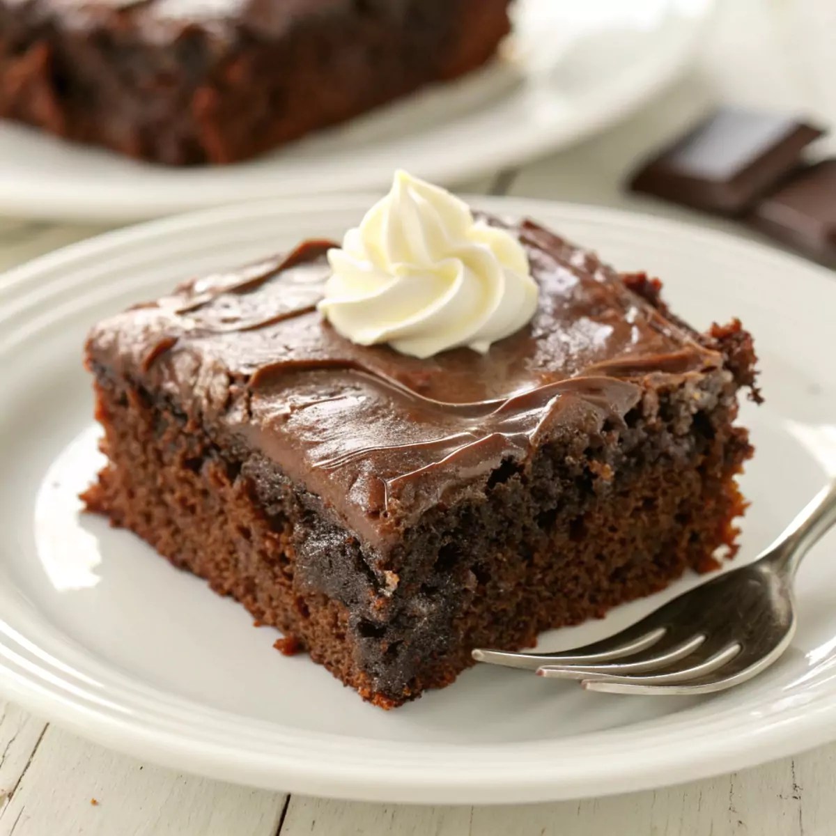 serving chocolate cake and pudding close-up