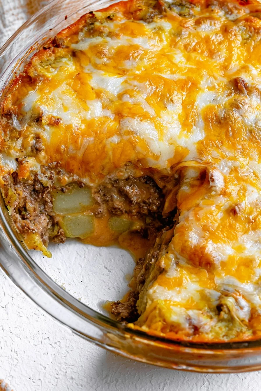 Delicious homemade cheeseburger pie served hot with toppings.