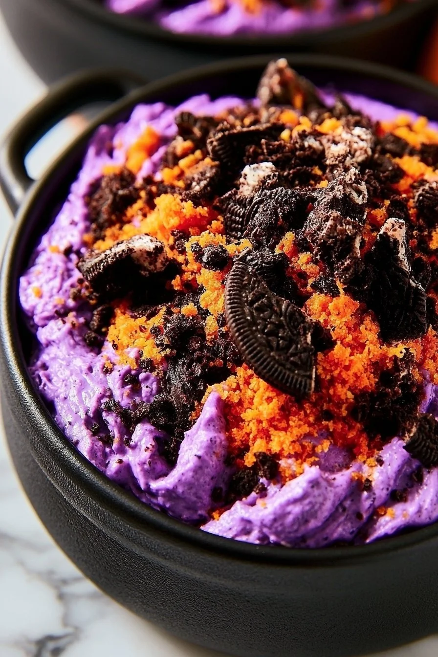 Spooky Halloween cheesecake dessert decorated with ghoulish toppings