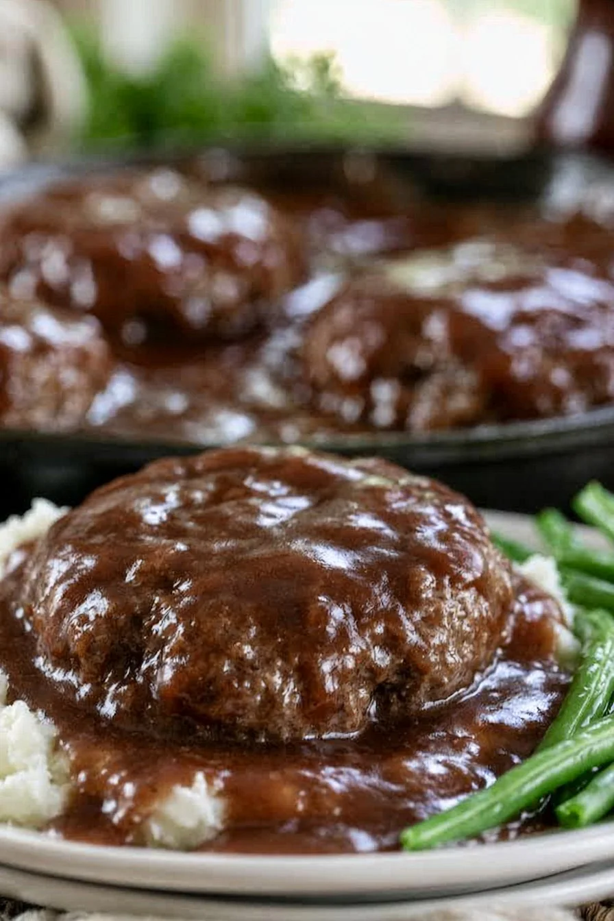 Homemade Salisbury steak served with mashed potatoes and rich gravy